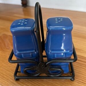 Longerberger salt and pepper in wrought iron caddy. Color is cornflower blue
